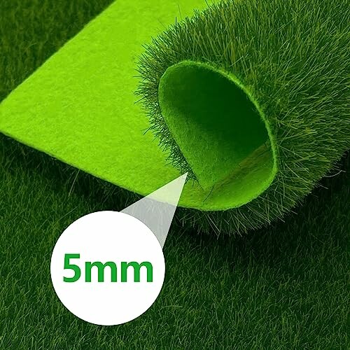 Close-up of a rolled artificial grass mat showing 5mm thickness.