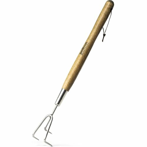 Wooden-handled garden hand cultivator with metal prongs.