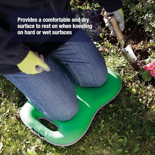 Person using a green kneeling pad while gardening