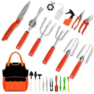 Assorted garden tools and accessories with orange handles.