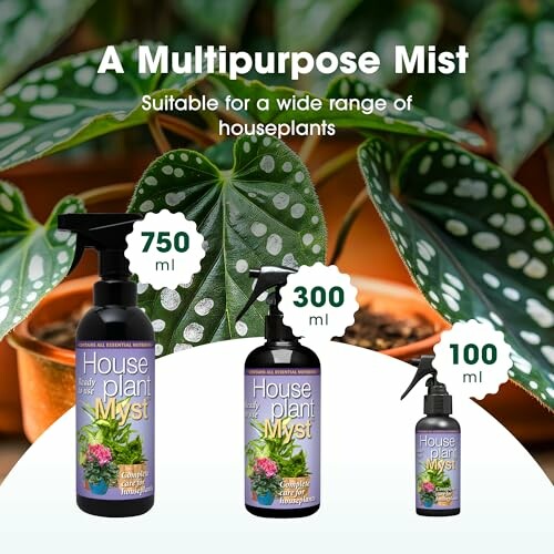 Three bottles of houseplant mist in different sizes with plants in the background.