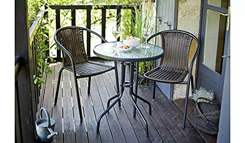 Outdoor bistro set with two chairs and a table on a balcony.