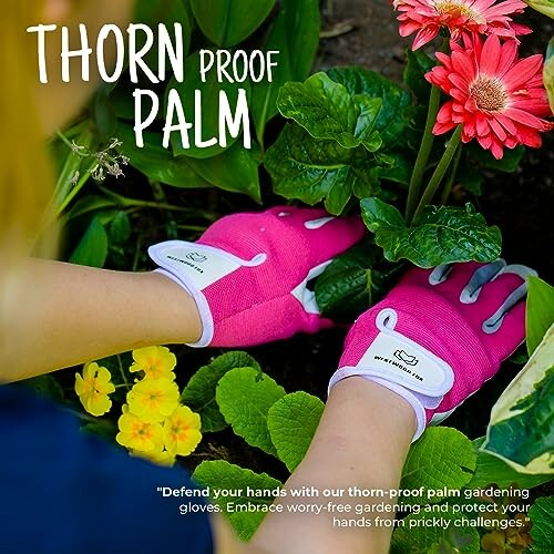 Person wearing pink gardening gloves handling plants