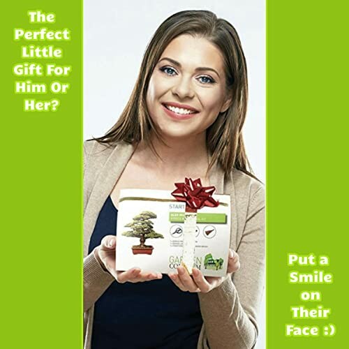 Woman smiling and holding a gift box with green background.